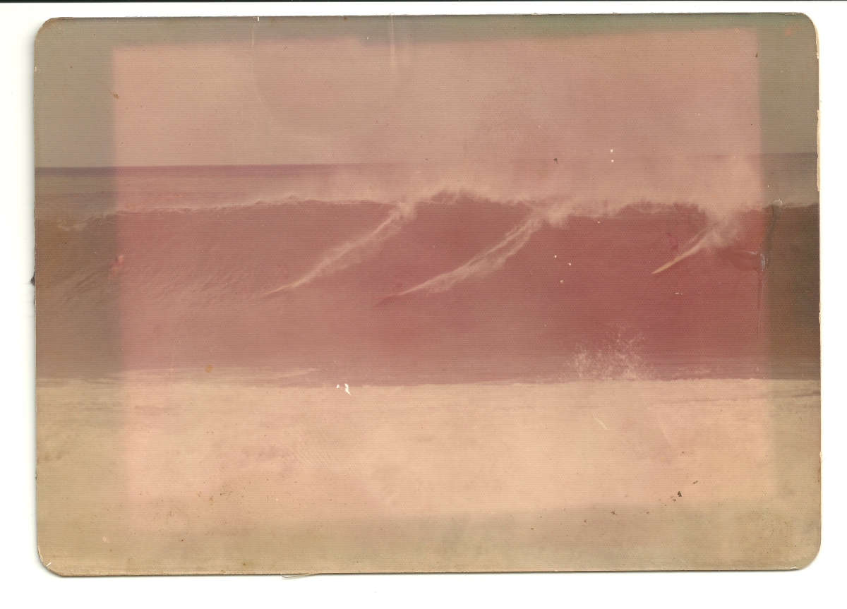 James MacLaren (middle rider) at Waimea Bay, Hawaii, 1973, photo by Billy Amell.